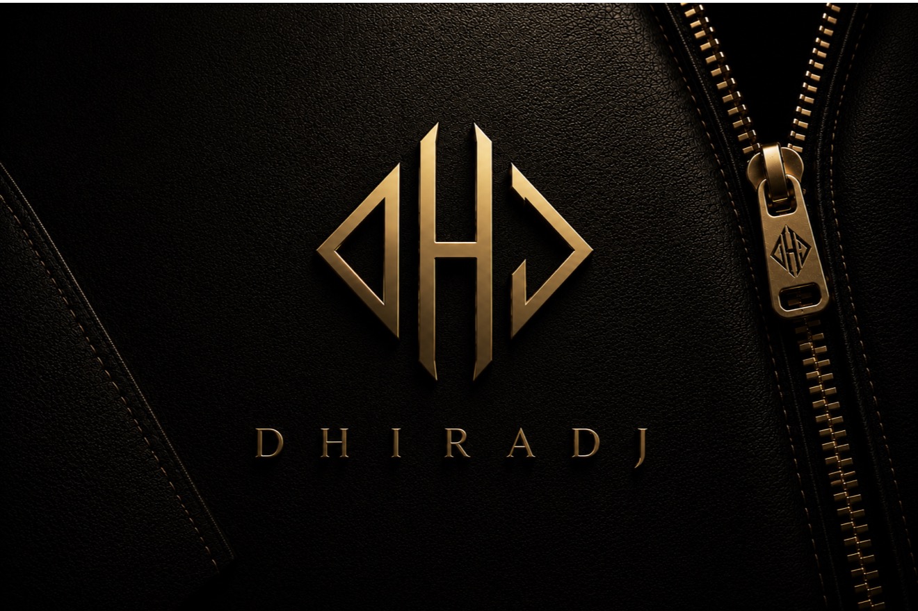 The DHIRADJ signature: a gold zip engraved with the original monogram, set in black leather